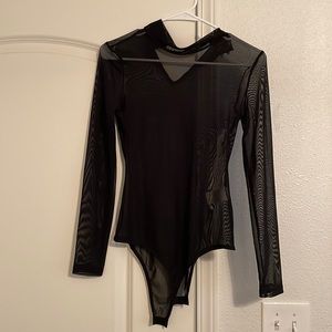 See through mesh black bodysuit